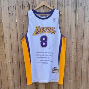 Kobe Bryant stitched up singed lakers jersey